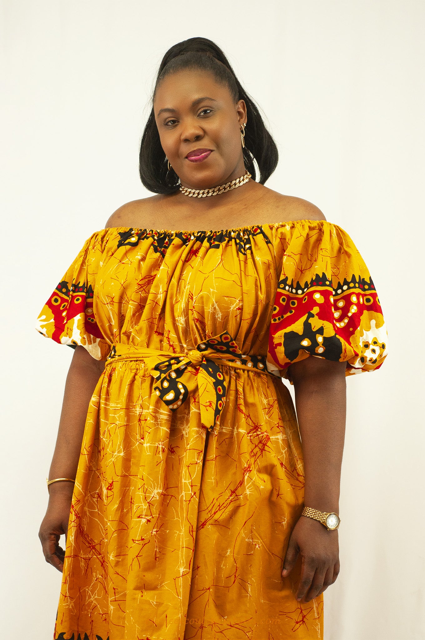 Robe épaules dénudé taille élastique couleurs orange et rouge